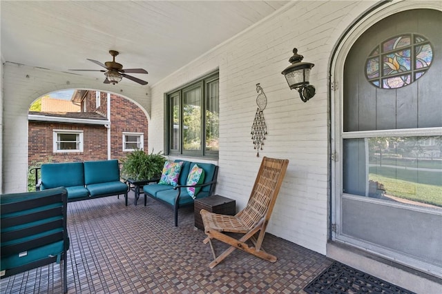 view of patio / terrace with ceiling fan and outdoor lounge area