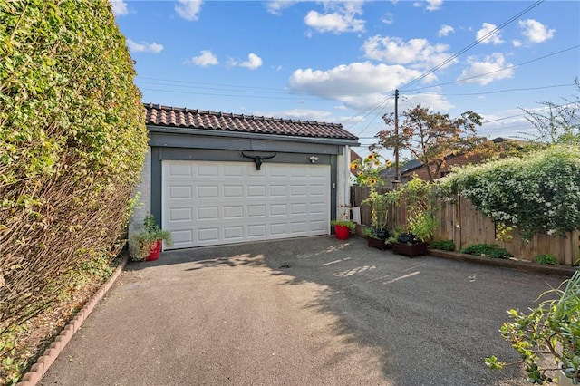 detached garage with fence