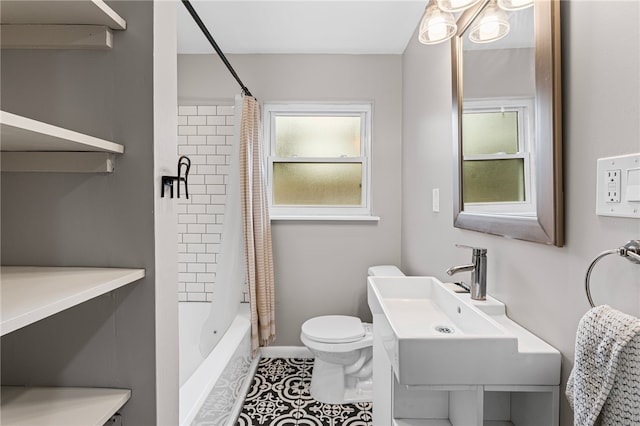 full bath with shower / bath combination with curtain, toilet, a sink, tile patterned flooring, and baseboards