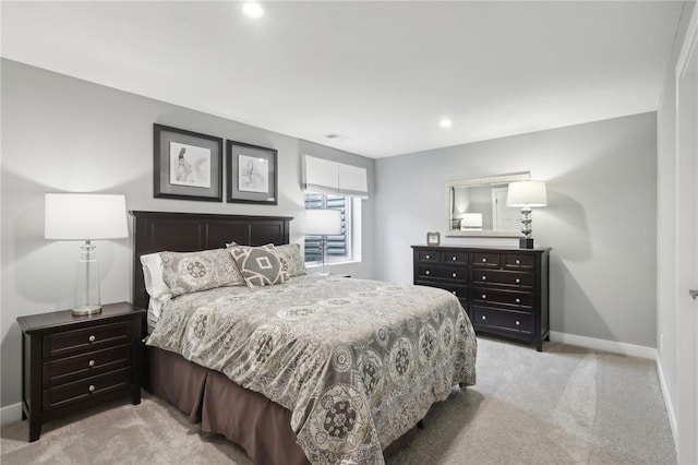 bedroom featuring light carpet, recessed lighting, visible vents, and baseboards