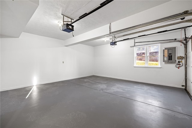 garage featuring baseboards, electric panel, and a garage door opener