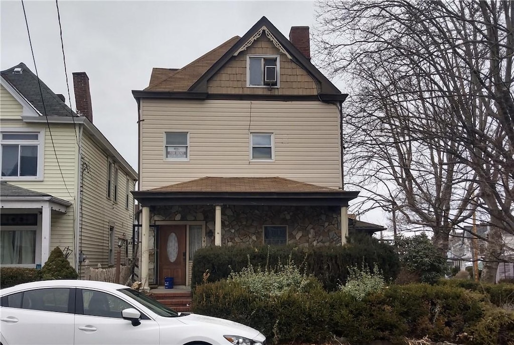 view of front of house with stone siding