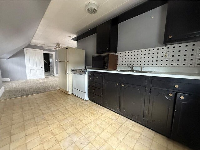 705 E 18th Ave, Munhall, PA 15120 - kitchen with a sink, black microwave, electric range oven, light countertops, and light floors