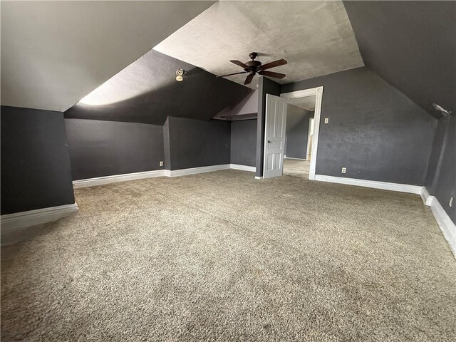 705 E 18th Ave, Munhall, PA 15120 - additional living space featuring ceiling fan, vaulted ceiling, carpet, and baseboards