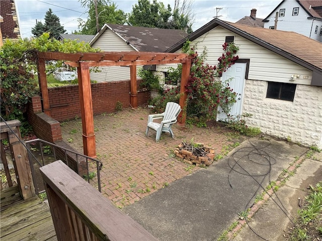 705 E 18th Ave, Munhall, PA 15120 - view of patio / terrace featuring a pergola and a fire pit