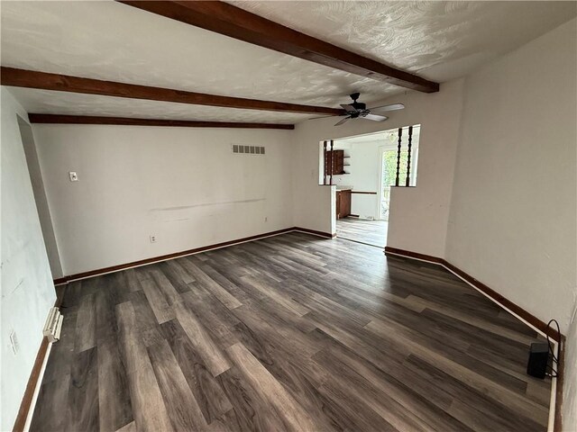 705 E 18th Ave, Munhall, PA 15120 - unfurnished room with beam ceiling, ceiling fan, dark wood-style flooring, and baseboards