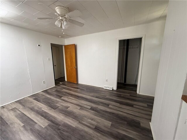 705 E 18th Ave, Munhall, PA 15120 - empty room with ceiling fan and dark wood finished floors