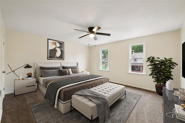 bedroom with carpet flooring, ceiling fan, and baseboards