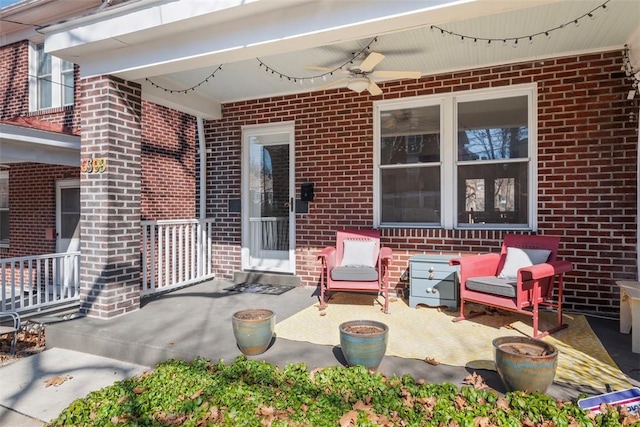 view of patio featuring ceiling fan