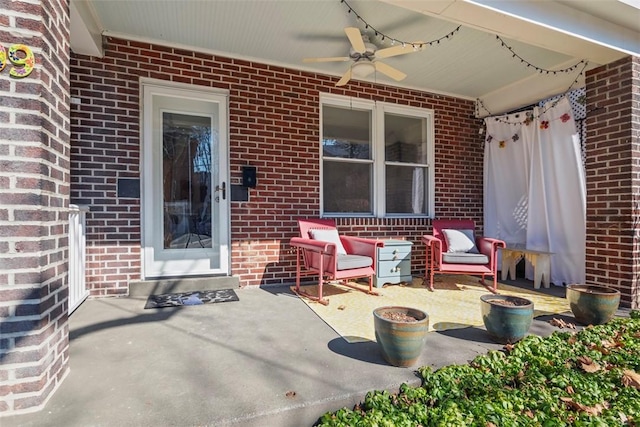 view of patio featuring ceiling fan