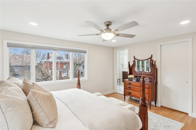 bedroom featuring baseboards, a ceiling fan, light wood-style flooring, and recessed lighting