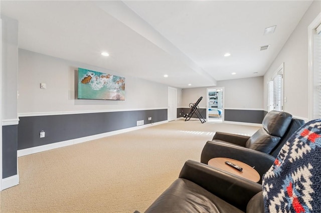 carpeted living room with recessed lighting, visible vents, and baseboards