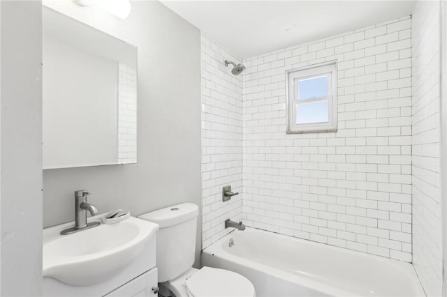 full bath with  shower combination, vanity, and toilet