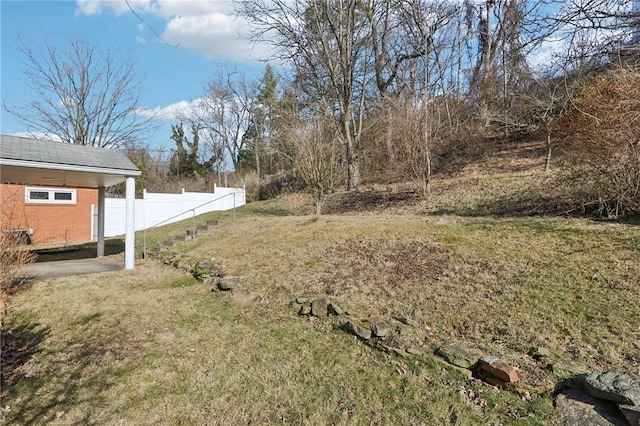 view of yard featuring fence