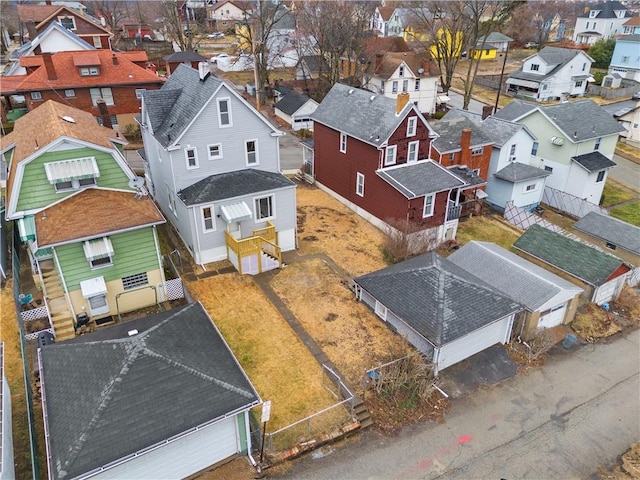 birds eye view of property with a residential view