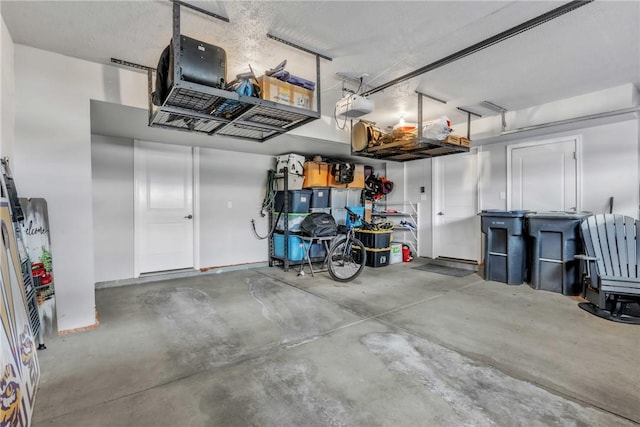 garage featuring a garage door opener