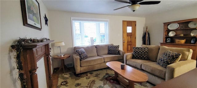 living room with a ceiling fan