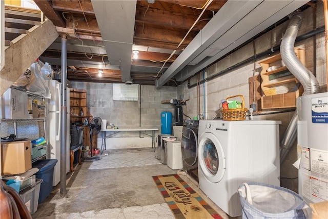 unfinished below grade area with gas water heater and independent washer and dryer