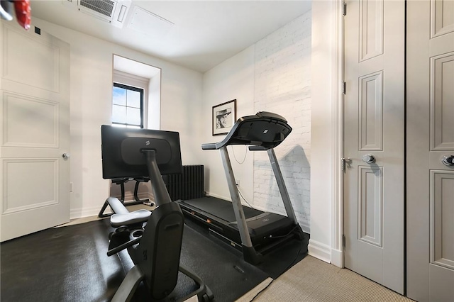 exercise area with baseboards