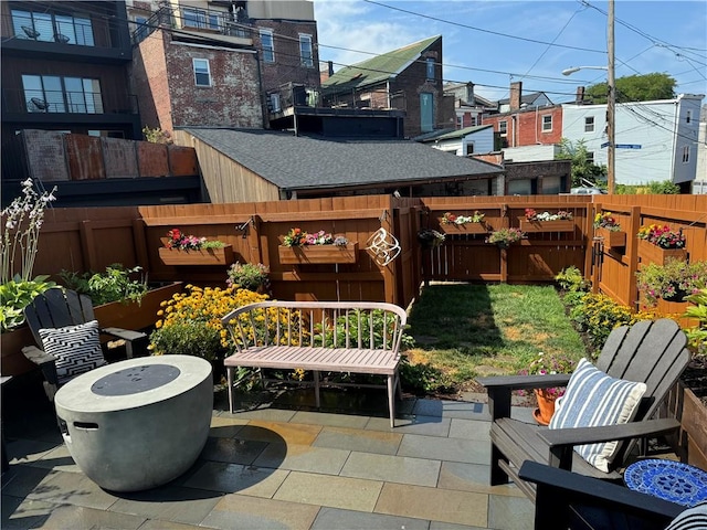 view of patio / terrace featuring fence