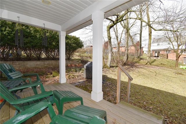 view of patio featuring a grill and a wooden deck