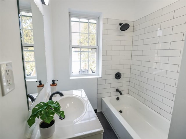 bathroom with vanity and shower / bathtub combination