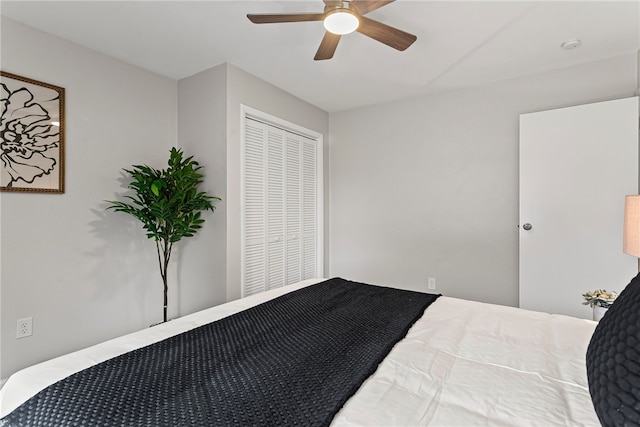 bedroom featuring a closet and a ceiling fan