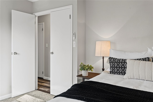 bedroom featuring baseboards