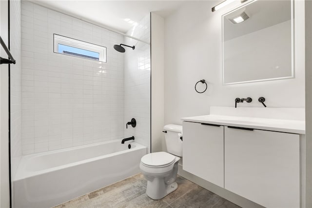 full bathroom with shower / tub combination, vanity, and toilet