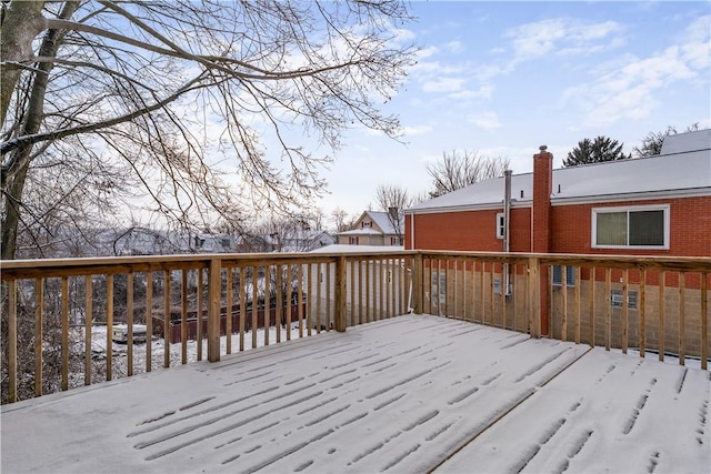 view of snow covered deck