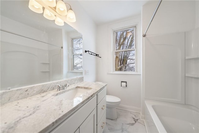 bathroom with shower / bathtub combination, toilet, vanity, baseboards, and marble finish floor