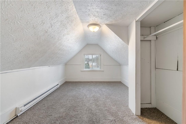 bonus room with a baseboard radiator, vaulted ceiling, a textured ceiling, and carpet