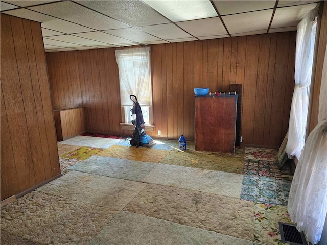 202 Central Ave, Chicora Boro, PA 16025 - workout area featuring a paneled ceiling, wooden walls, and carpet floors