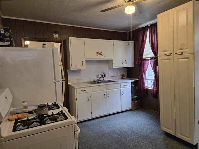 202 Central Ave, Chicora Boro, PA 16025 - kitchen with white appliances, a sink, light countertops, white cabinetry, and a ceiling fan