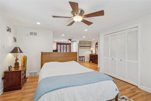 bedroom with light wood-type flooring, visible vents, and recessed lighting