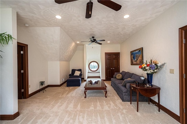 carpeted living area with lofted ceiling, recessed lighting, a textured ceiling, and baseboards