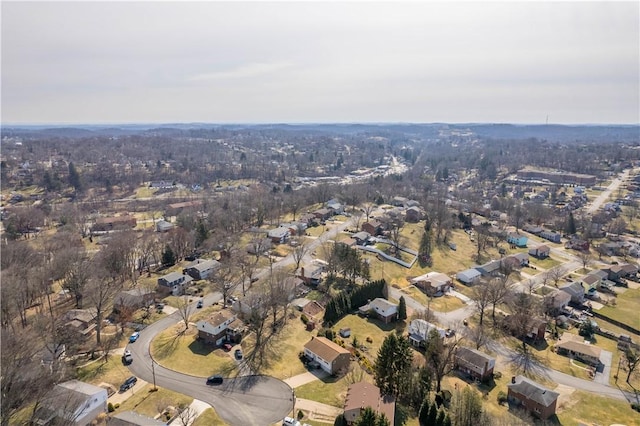 birds eye view of property with a residential view