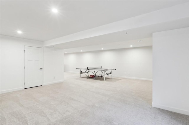 recreation room with recessed lighting, light colored carpet, and baseboards