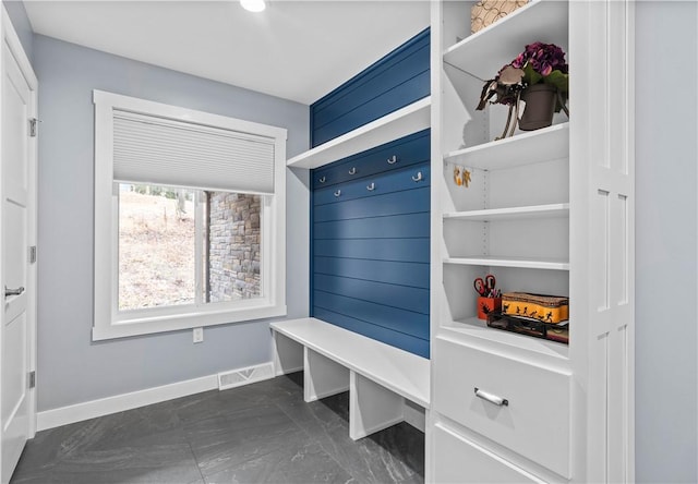 mudroom with baseboards and visible vents