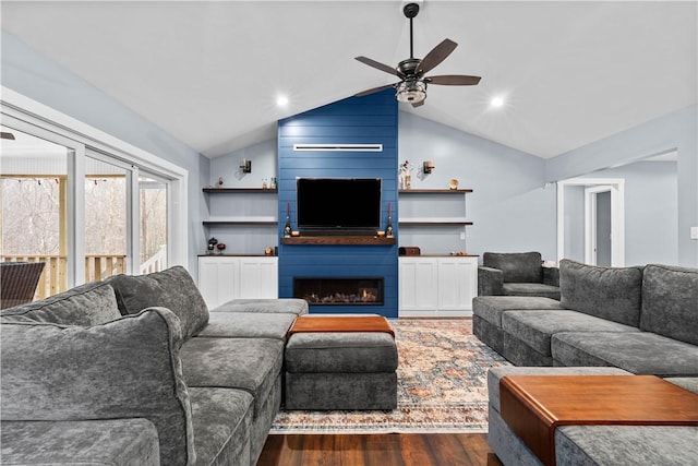 living room with dark wood-style floors, a fireplace, lofted ceiling, recessed lighting, and ceiling fan