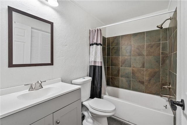 bathroom with shower / tub combo, a textured wall, vanity, and toilet