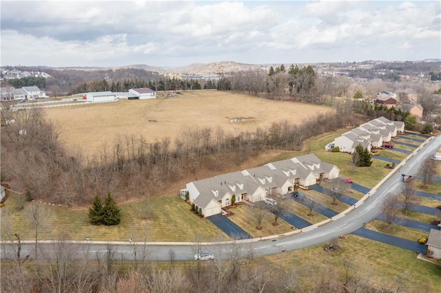 drone / aerial view with a rural view and a mountain view