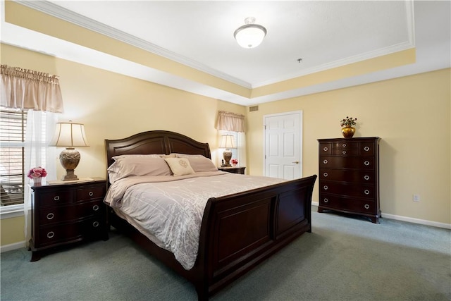 bedroom with light carpet, a tray ceiling, ornamental molding, and baseboards