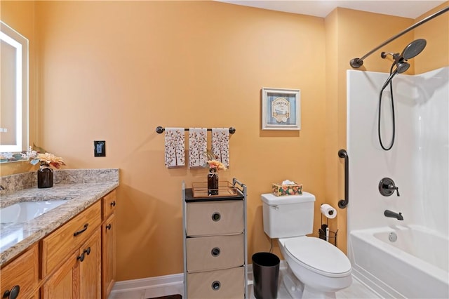 bathroom featuring  shower combination, baseboards, toilet, and vanity