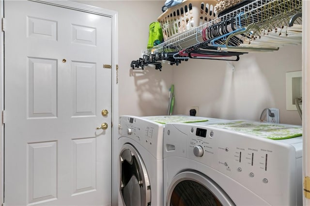 laundry area featuring laundry area and washer and dryer