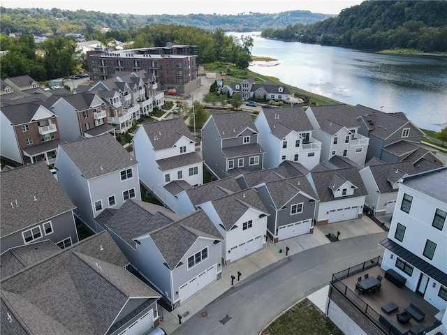 aerial view with a water view and a residential view