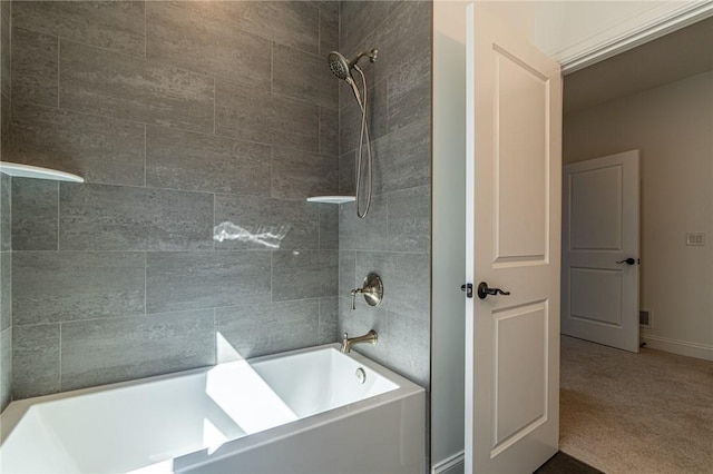 full bath featuring shower / tub combination and baseboards