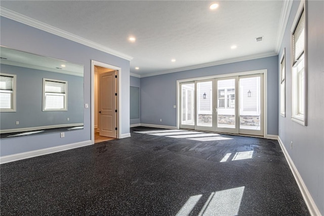 empty room with recessed lighting, visible vents, crown molding, and baseboards