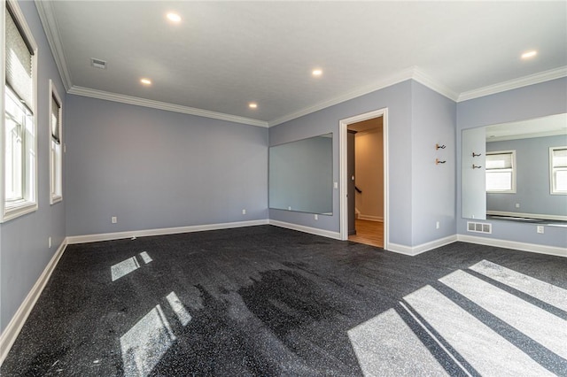 spare room featuring ornamental molding, recessed lighting, visible vents, and baseboards