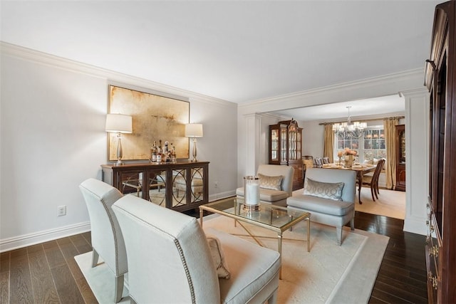 living area with dark wood-style floors, crown molding, and baseboards